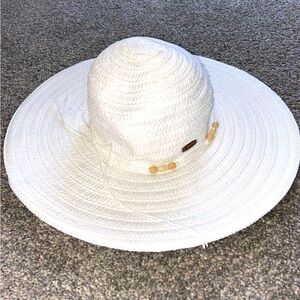white beach straw hat
